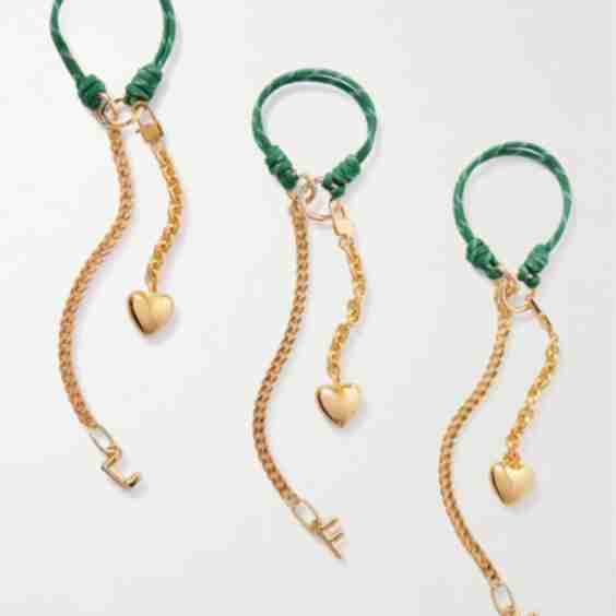 Initial gold-plated and silk-cord bag charm