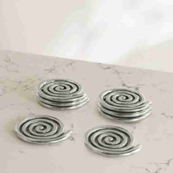 Etagere Spiral set of eight nickel-plated coasters
