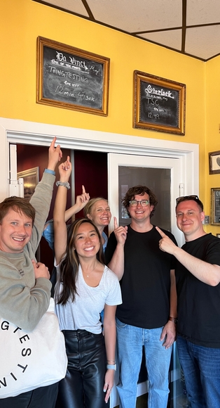 Team pointing a thingtesting message