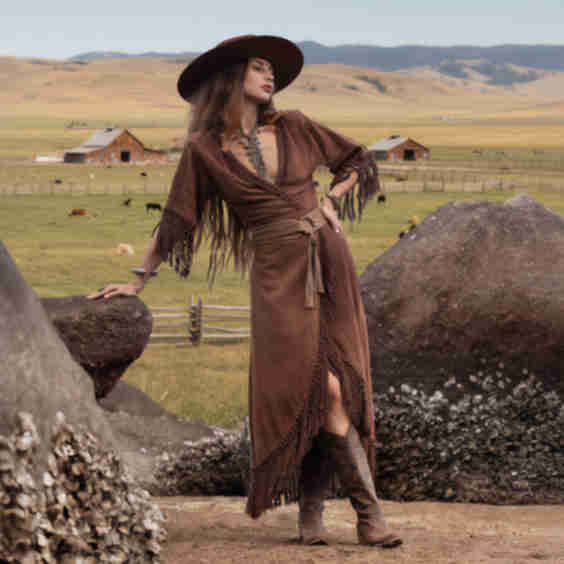 Vintage Western Elegance Fringed Dress in a Prairie Landscape