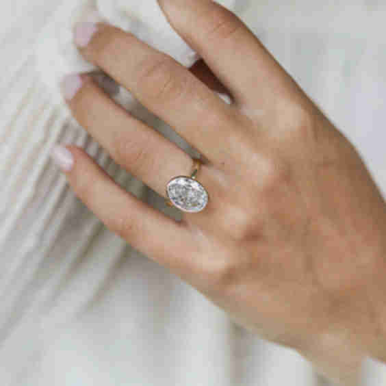 Bezel Set Crushed Ice Mixed Oval Moissanite Ring