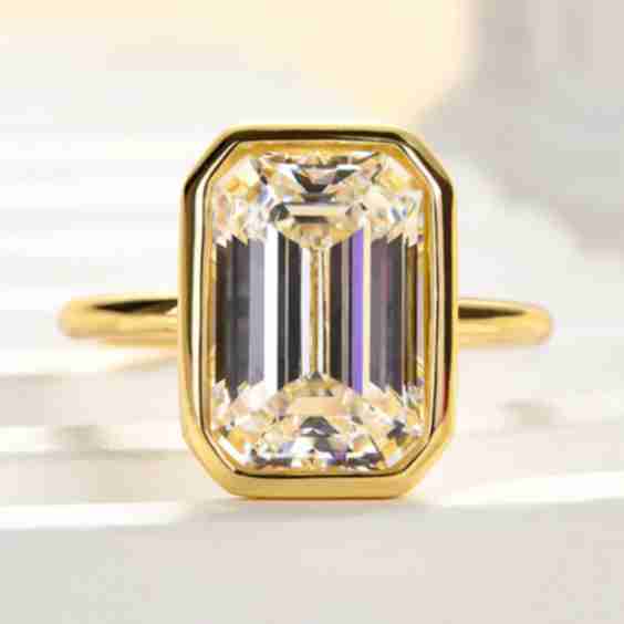 Unique Yellow Gold Emerald Cut Bezel Engagement Ring