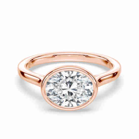 Oval Bezel Diamond Cathedral Ring