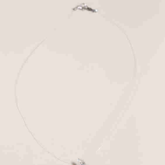 Pear Shaped “Floating” Diamond Pendant